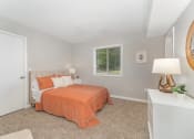 Thumbnail 12 of 43 - a bedroom with a bed and a window at Village 1373, Greensboro North Carolina