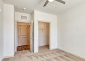 Thumbnail 4 of 40 - a renovated living room with white walls and a ceiling fan at The Walker Virginia Center, Virginia