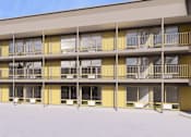 Thumbnail 15 of 20 - A large building with a lot of windows and balconies.