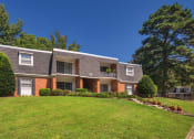 Thumbnail 39 of 39 - a house with a green lawn in front of it