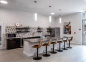 Thumbnail 7 of 47 - Resident Lounge and Social Space equipped with clubhouse kitchen Centro at Pine Nash, Wilson, NC