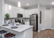 Thumbnail 40 of 47 - Kitchens designed to enhance your culinary experience and entertain effortlessly Centro at Pine Nash, Wilson, North Carolina