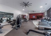 Thumbnail 2 of 47 - Expansive State-of-the-Art Fitness Center equipped with Echelon Row and True Fitness to meet cardio and strength training needs Centro at Pine Nash, Wilson, NC