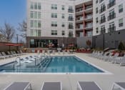 Thumbnail 44 of 47 - Refreshing Salt Water Pool with Expansive Sun Deck at Centro at Pine Nash, Wilson, NC