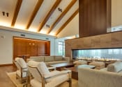 Thumbnail 2 of 81 - a living room with couches and chairs and a fireplace at Ainsworth, Virginia, 23228