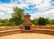 Thumbnail 6 of 35 - Fire pit at Logans Landing Apartments in Lynchburg VA