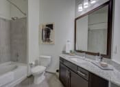 Thumbnail 32 of 55 - Bathroom With Vanity Lights at The Lincoln Apartments, Raleigh, 27601
