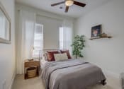 Thumbnail 33 of 55 - Bedroom With Ceiling Fan at The Lincoln Apartments, Raleigh, NC