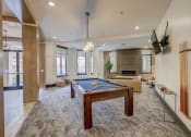 Thumbnail 7 of 55 - Clubhouse With Billiards Table at The Lincoln Apartments, Raleigh, North Carolina