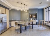 Thumbnail 9 of 55 - Clubhouse Kitchen at The Lincoln Apartments, Raleigh, NC
