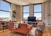 Thumbnail 2 of 56 - Living Room With TV at Residences at Richmond Trust, Richmond, 23219