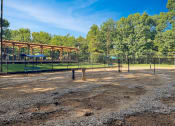 Thumbnail 11 of 44 - Dog Park at Wendover River Oaks Apartments, North Carolina, 27409
