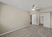 Thumbnail 10 of 21 - a bedroom with a ceiling fan