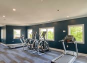 Thumbnail 13 of 35 - Gym at Logans Landing Apartments in Lynchburg VA