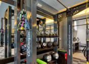 Thumbnail 18 of 38 - a gym with weights and other gym equipment on display at Aura Stonebridge, Virginia, 23225