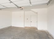 Thumbnail 40 of 81 - a room with a concrete floor and white walls at Ainsworth, Richmond, Virginia