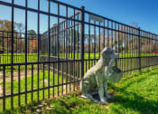 Thumbnail 15 of 52 - a statue of a statue in front of a fence  at Bayville Apartments, Virginia Beach, 23455