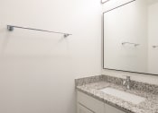 Thumbnail 37 of 81 - a bathroom with a sink and a mirror at Ainsworth, Virginia,3228