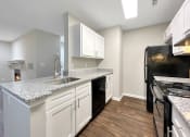 Thumbnail 35 of 44 - Kitchen at Wendover River Oaks, North Carolina, 27409