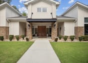 Thumbnail 1 of 57 - the front of a white house with a walkway and grass at Shellbrook, Raleigh, 27609