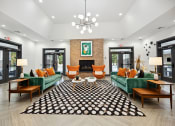 Thumbnail 2 of 57 - a living room with couches and chairs and a fireplace at Shellbrook, Raleigh, NC, 27609
