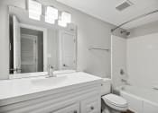 Thumbnail 50 of 57 - a bathroom with a sink toilet and a mirror at Shellbrook, Raleigh