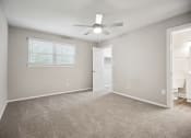 Thumbnail 38 of 57 - an empty room with carpet and a ceiling fan at Shellbrook, Raleigh, NC