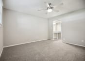 Thumbnail 51 of 57 - an empty room with carpet and a ceiling fan at Shellbrook, North Carolina, 27609