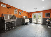 Thumbnail 23 of 57 - the tasting room has two stainless steel tanks and a door to the patio at Shellbrook, Raleigh, 27609