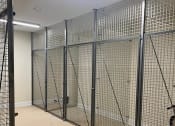 Thumbnail 26 of 27 - the inside of a jail cell with welded metal doors