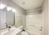 Thumbnail 40 of 40 - a bathroom with a sink toilet and bathtub