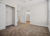 Thumbnail 16 of 47 - Discover the perfect blend of comfort and functionality in our spacious bedrooms featuring ample closet storage and natural lighting at Centro at Pine Nash, Wilson, NC