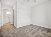 Thumbnail 15 of 47 - Expansive main bedroom with ensuite bathroom and walk-in closet storage Centro at Pine Nash, Wilson
