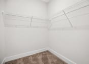 Thumbnail 18 of 47 - Expansive walk-in closets, designed to meet your storage requirements with style and ease at Centro at Pine Nash, Wilson, NC