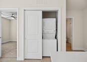 Thumbnail 26 of 47 - Apartment homes equipped with in-unit laundry appliances Centro at Pine Nash, Wilson, NC