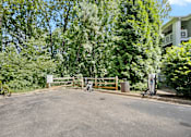 Thumbnail 25 of 29 - A sign is on a gate in front of a house.