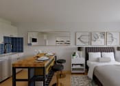 Thumbnail 14 of 20 - A modern bedroom with a large bed and a kitchen area.