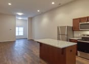 Thumbnail 16 of 35 - Kitchen at Logans Landing Apartments in Lynchburg VA