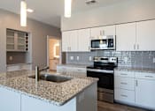 Thumbnail 25 of 36 - kitchen at Helix Apartments in Summit Pointe Chesapeake VA