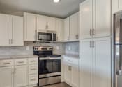 Thumbnail 41 of 53 - Kitchen cabinets at The View at Blue Ridge Commons Apartments, Virginia, 24017