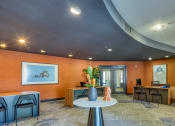 Thumbnail 50 of 60 - leasing office with desks and seating areas at Proximity at ODU, Norfolk, Virginia