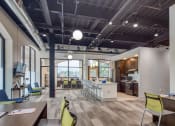 Thumbnail 39 of 46 - an open concept office space with a kitchen and dining area at The Hudson, Richmond, VA