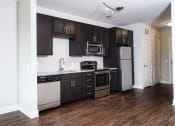Thumbnail 50 of 55 - Fully Furnished Kitchen at The Lincoln Apartments, Raleigh, NC, 27601