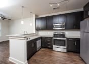Thumbnail 49 of 55 - Modern Kitchen With Custom Cabinet at The Lincoln Apartments, North Carolina