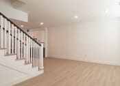 Thumbnail 19 of 81 - a bedroom with a staircase in a 555 waverly unit at Ainsworth, Richmond, 23228