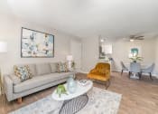 Thumbnail 2 of 43 - a living room with a couch and a table at Village 1373, North Carolina, 27455