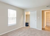 Thumbnail 10 of 39 - Carpeted bedrooms at Colonial Towne Apartments