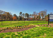Thumbnail 16 of 52 - a park with a sign apartments  at Bayville Apartments, Virginia Beach, VA, 23455