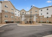 Thumbnail 27 of 27 - the preserve at ballantyne commons street entrance to apartment building