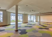 Thumbnail 67 of 81 - a large room with a colorful carpet in the middle of it at Ainsworth, Richmond, Virginia